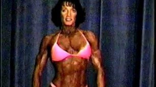 'Mature Muscle Woman Flexing Belly Dance'