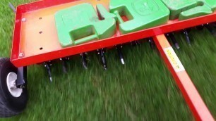 'Aerating with my new Land Pride aerator.'