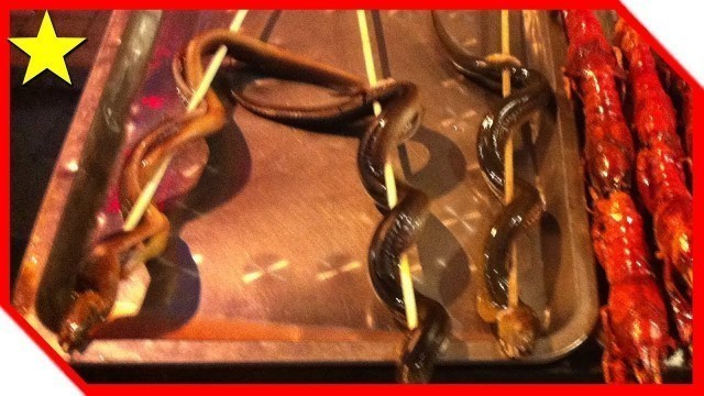 'Beijing street food - What does snake taste like'