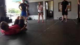 'CrossFit UvU - coach walking class through movements and modifications. Small classes have the best'