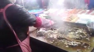 'live snake\'s cooked in china\'s street food'
