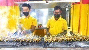 'Omani STREET FOOD at NIGHT!! Endless Mishkak + Omani Burgers | Muscat, Oman'
