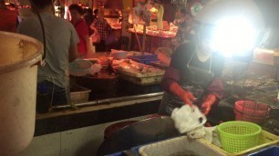 'Chinese Woman Fileting Live Snake'