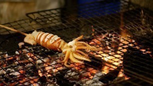 'Squid Cooked on the Grill Grate in Night Food Market, Thailand Street Food Thailand'