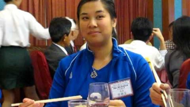 'China 2008 #3 - Crazie trying snake fried rice'