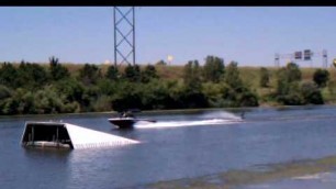 '7 year old kid water ski jumping at the pits...'