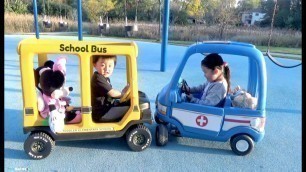 'Riding School Bus and Ambulance Ride On Cars at the Playground'
