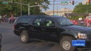 'President Trump drives by supporters outside Walter Reed Medical Center.'