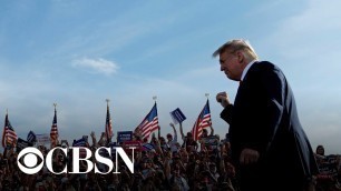 'Trump holds rallies despite warnings from health officials of coronavirus surge'
