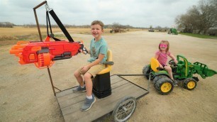 'Using nerf gun tractor to stop a bad guy | Tractors for kids'
