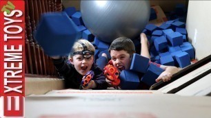 'Box Fort Nerf Battle! Ethan Vs. Cole Nerf Attack in a Crazy Huge Cardboard Box Base'