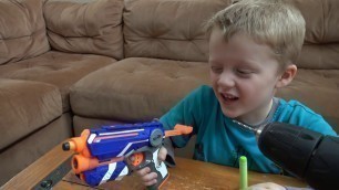 'Nerf Vs Wild Lizard! Crazy Lizard Toy Runs Wild and the Boys take Action with Nerf Blasters!'