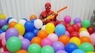 'Spider Man Nerf Gun Popping Balloons! (spider-man in real life)'