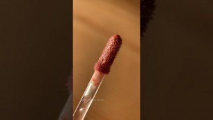 'close-up + #swatch of the @colourpopcosmetics lux #lipoil in hot shot 