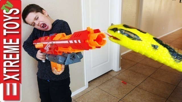'Nerf Guns Vs. Wild Boa Constrictor! Crazy Giant Snake Toy Tries to Attack Boys and Jaws!'