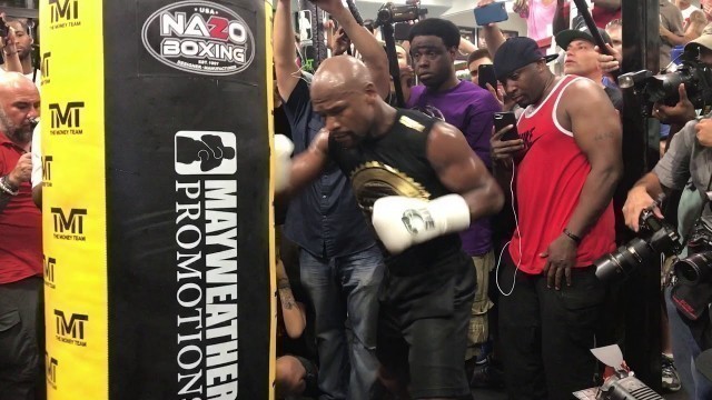'Floyd Mayweather digging to the body! HEAVY BODY SHOTS during media workout for McGregor!'