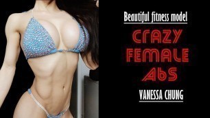 'Beautiful fitness model flexing her crazy female abs!'