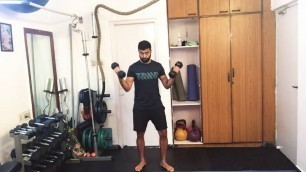 'Standing dumbbell crossover chest'