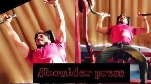 'shoulder press machine workout@light weight@gym'
