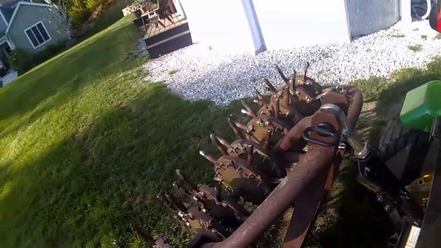 'Aerating Lawn with Ryan 6\' Aerator on a John Deere 2032R - POV'