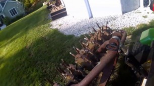 'Aerating Lawn with Ryan 6\' Aerator on a John Deere 2032R - POV'