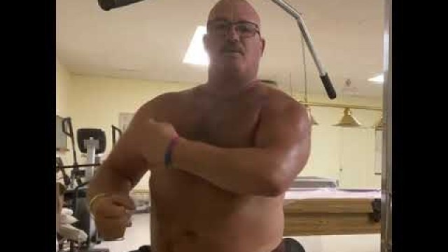 'Sweaty poses after workout from 55 year old muscle dad with padding'